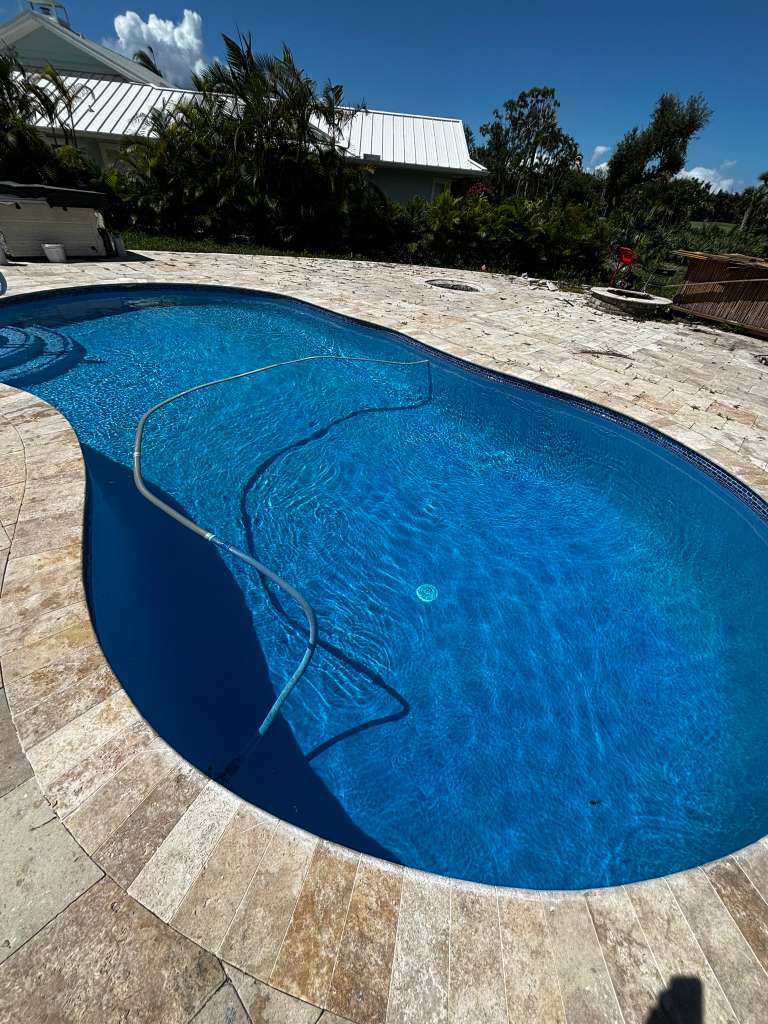 Elegant pool with new coping and tiles